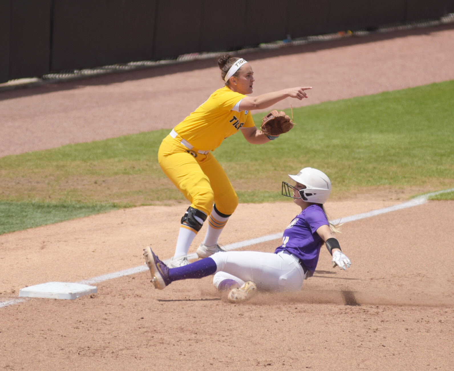 Sara Jubas slides into third base